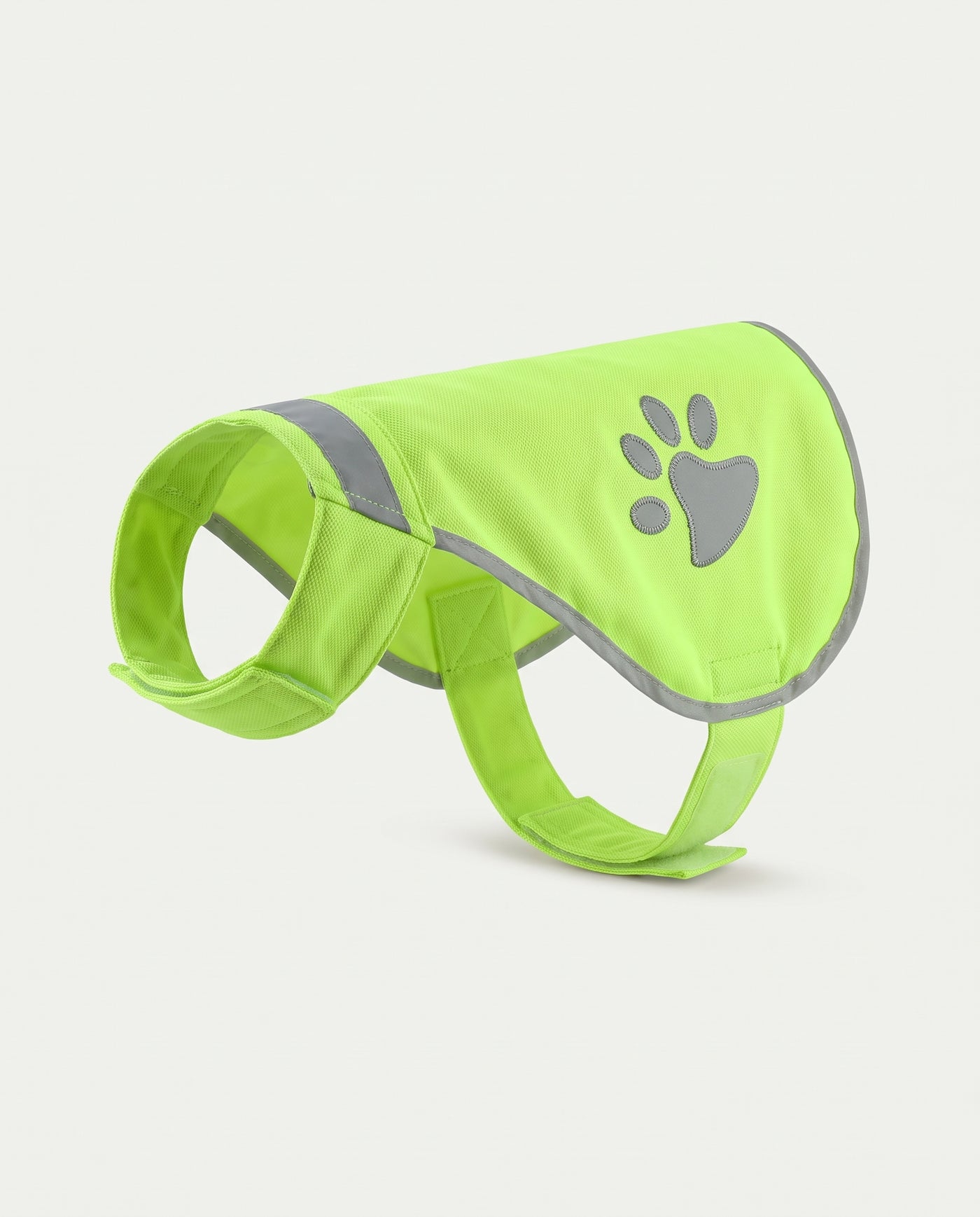 The Beckon hi-vis dog vest on its own, showing the collar, reflective strip, paw prints and hook-and-loop belly strap